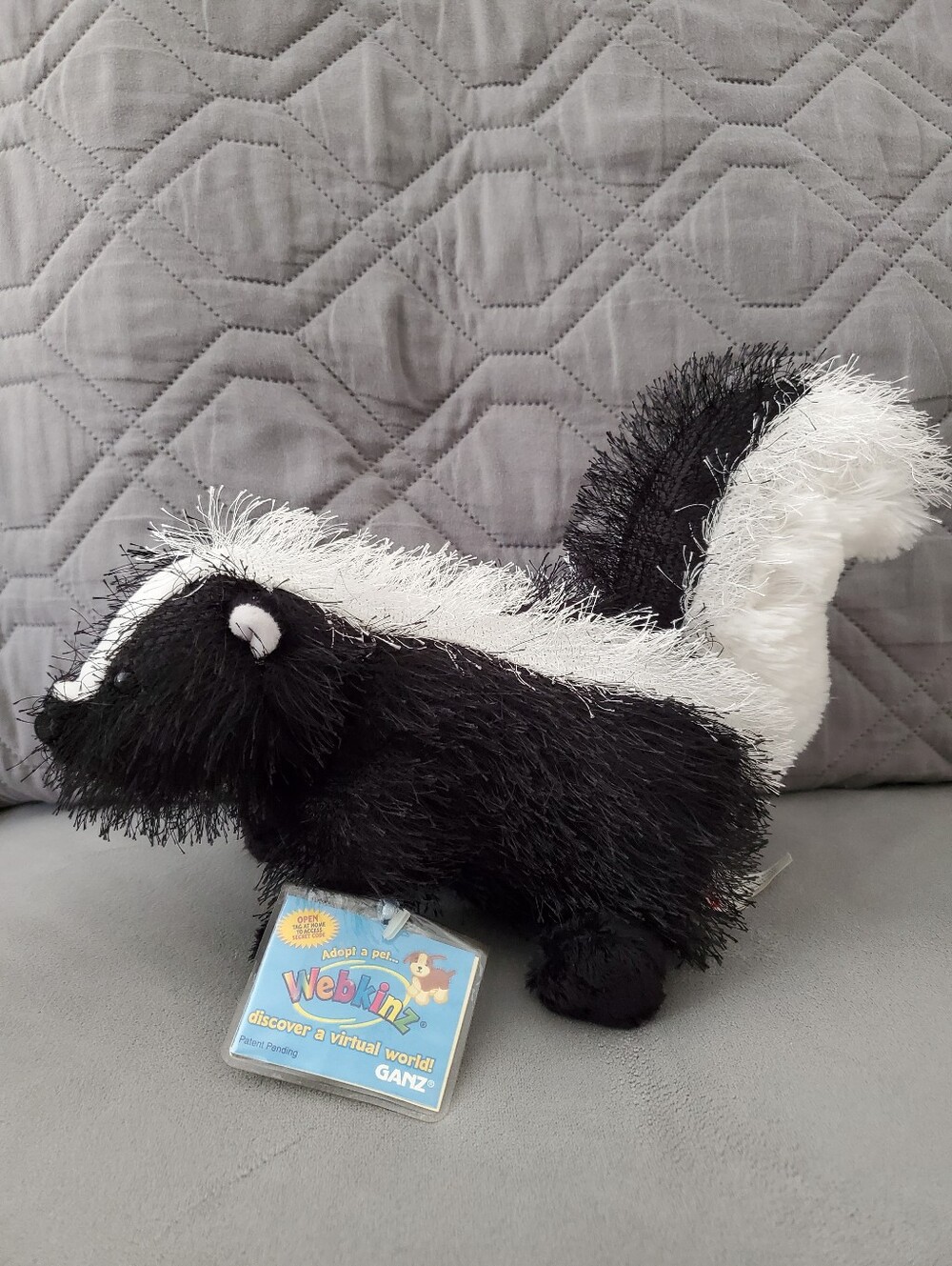 GANZ Webkinz plush skunk with code